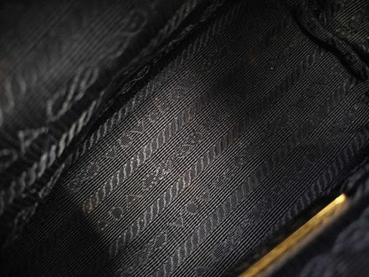 PRADA denim makeup pouch