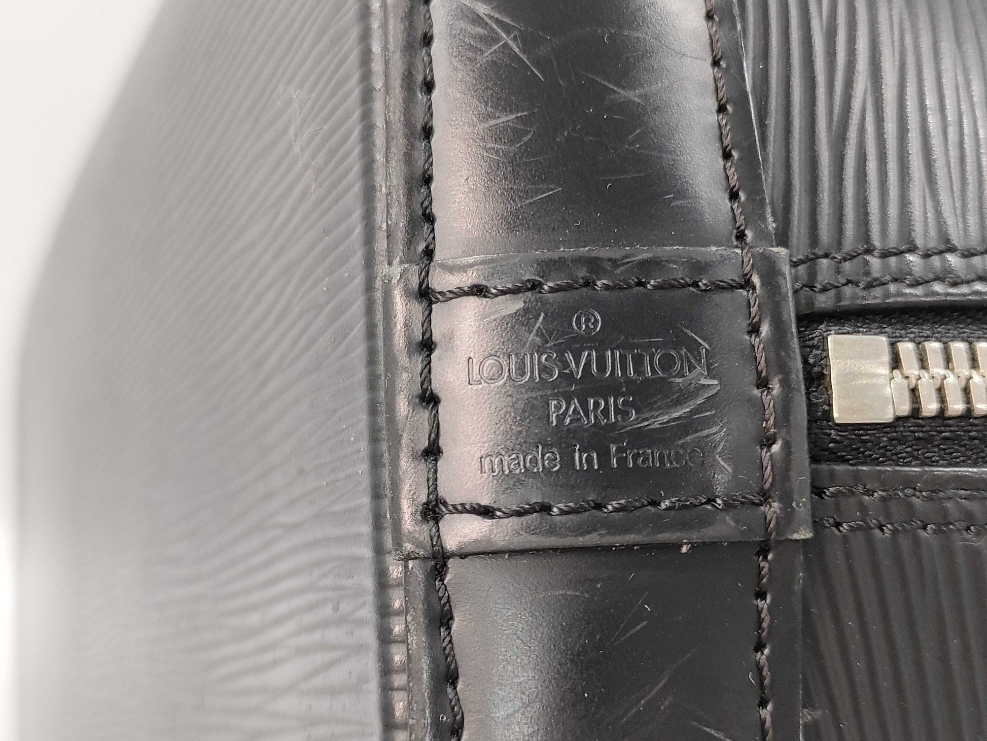 LOUIS VUITTON Epi Alma PM Boston Bag with Cracked Zipper Rail