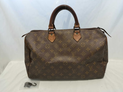 LOUIS VUITTON RFID Unverifiable, Serial Unverifiable, Monogram Old Papillon Handbag with Pouch