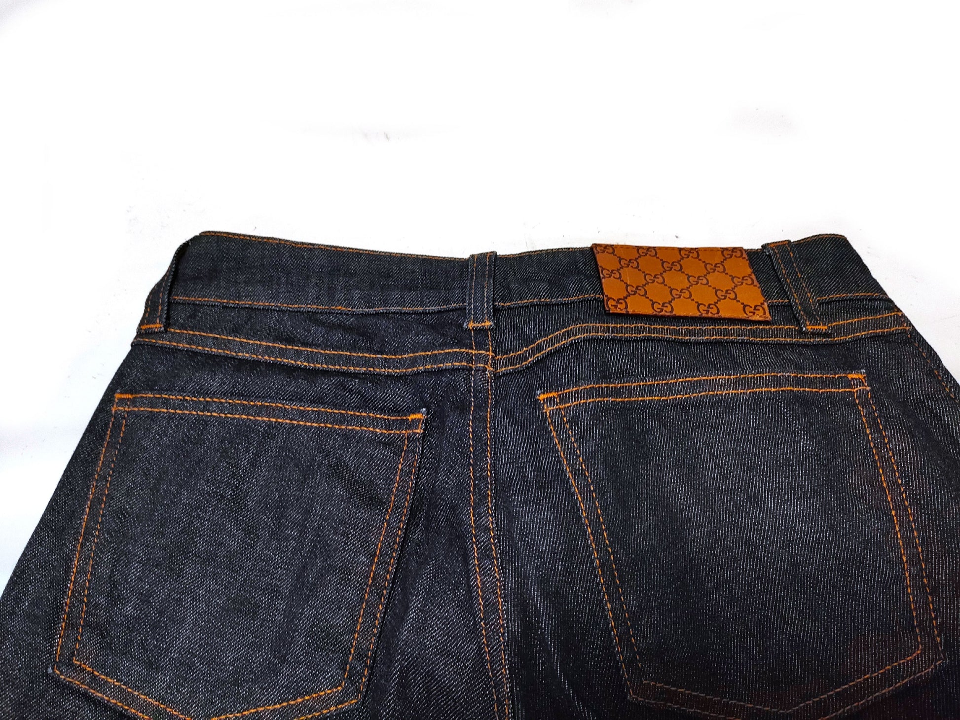 GUCCI Denim Pants with Heart Charm