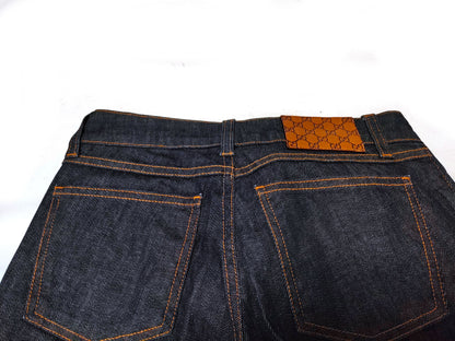 GUCCI Denim Pants with Heart Charm