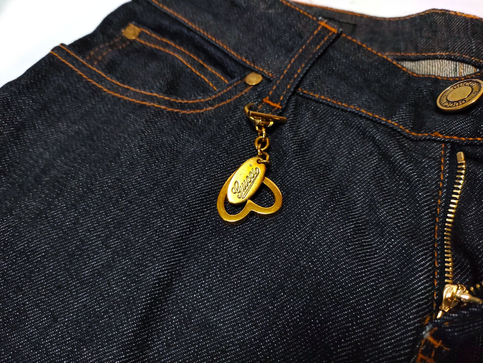 GUCCI Denim Pants with Heart Charm