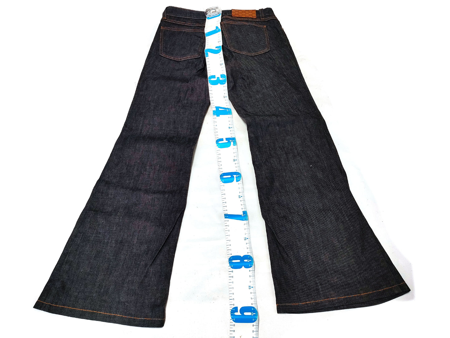 GUCCI Denim Pants with Heart Charm