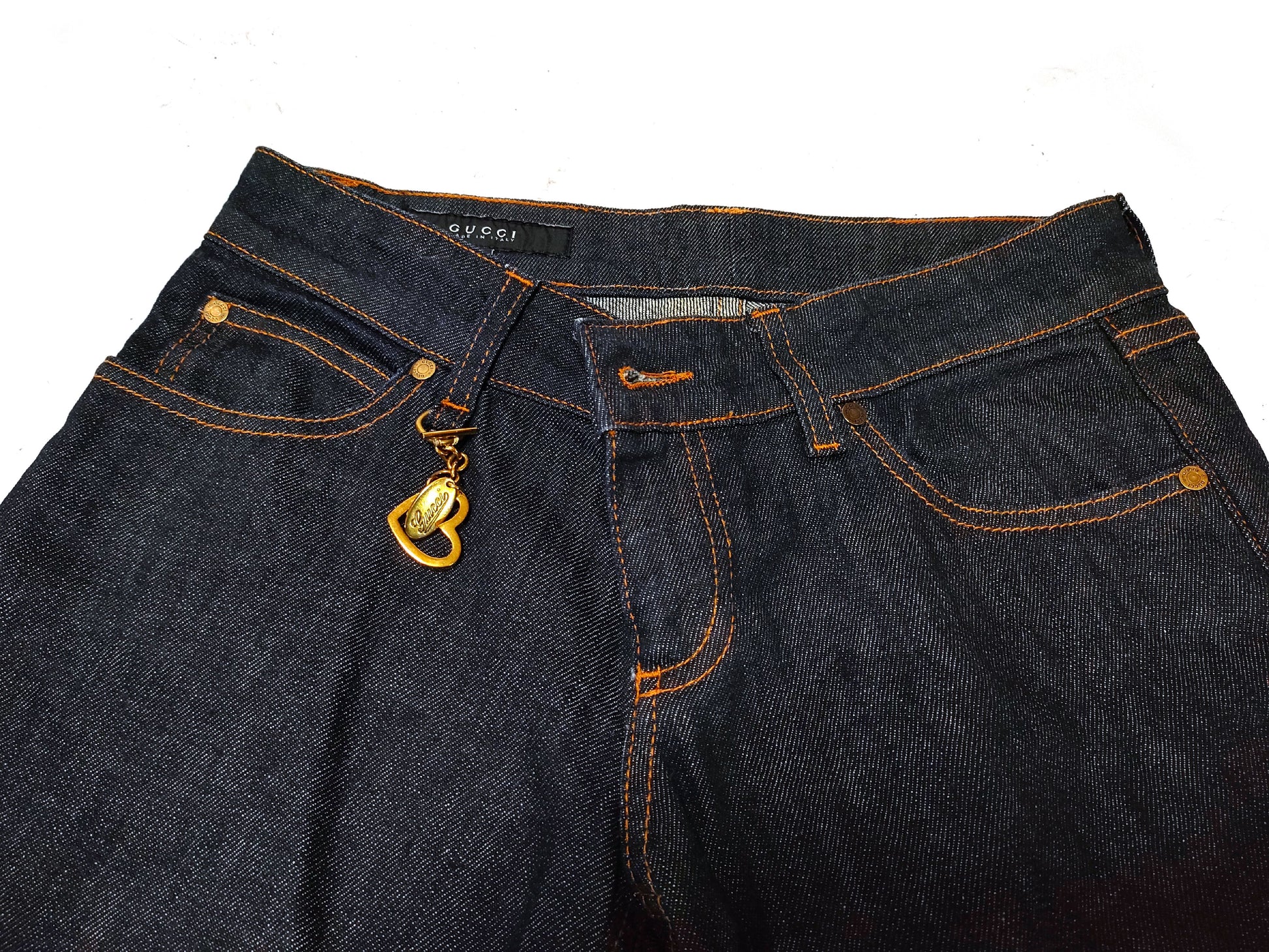 GUCCI Denim Pants with Heart Charm