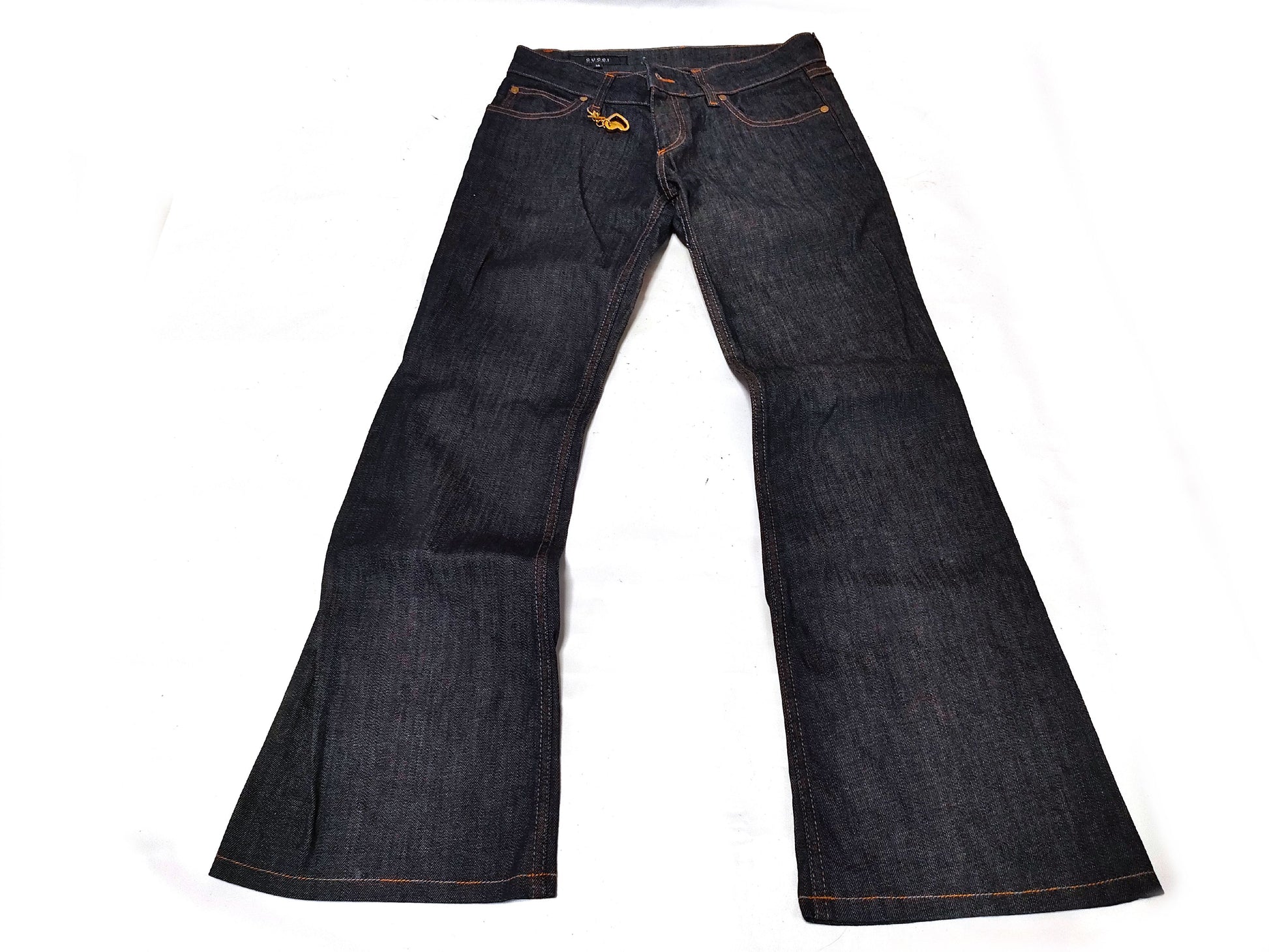 GUCCI Denim Pants with Heart Charm