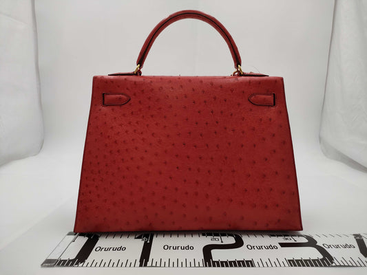 HERMES Kelly 32 Ostrich Handbag in Pink with Gold Hardware