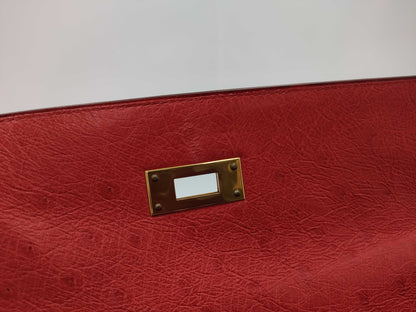 HERMES Kelly 32 Ostrich Handbag in Pink with Gold Hardware