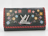 LOUIS VUITTON Epi Wallet Louis Vuitton Epi Portefeuille Twist Flower Wallet