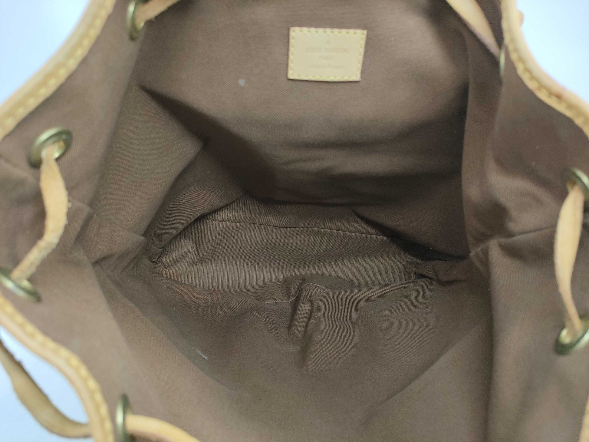 LOUIS VUITTON Monogram Sac Adobo Fall Backpack