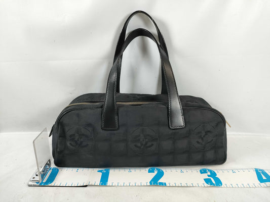 CHANEL New Travel Line Handbag Nylon and Leather
