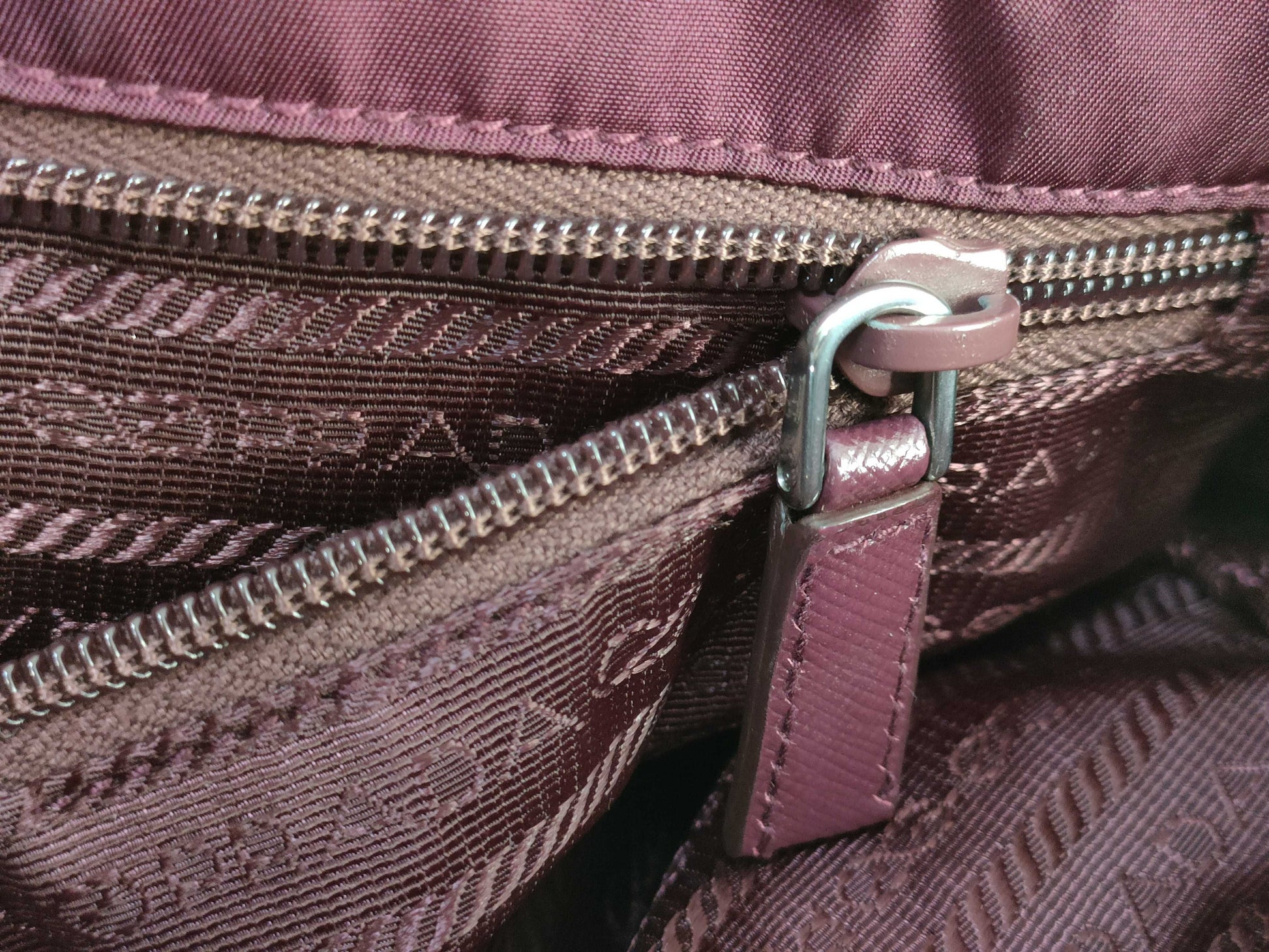 PRADA nylon handbag with leather triangle logo