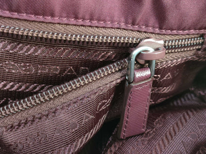 PRADA nylon handbag with leather triangle logo