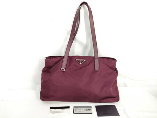 PRADA nylon handbag with leather triangle logo