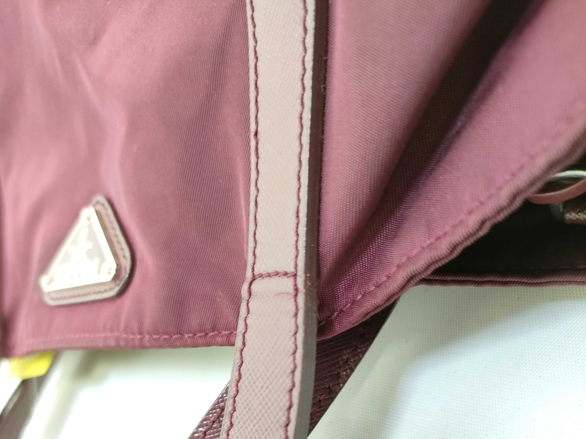 PRADA nylon handbag with leather triangle logo