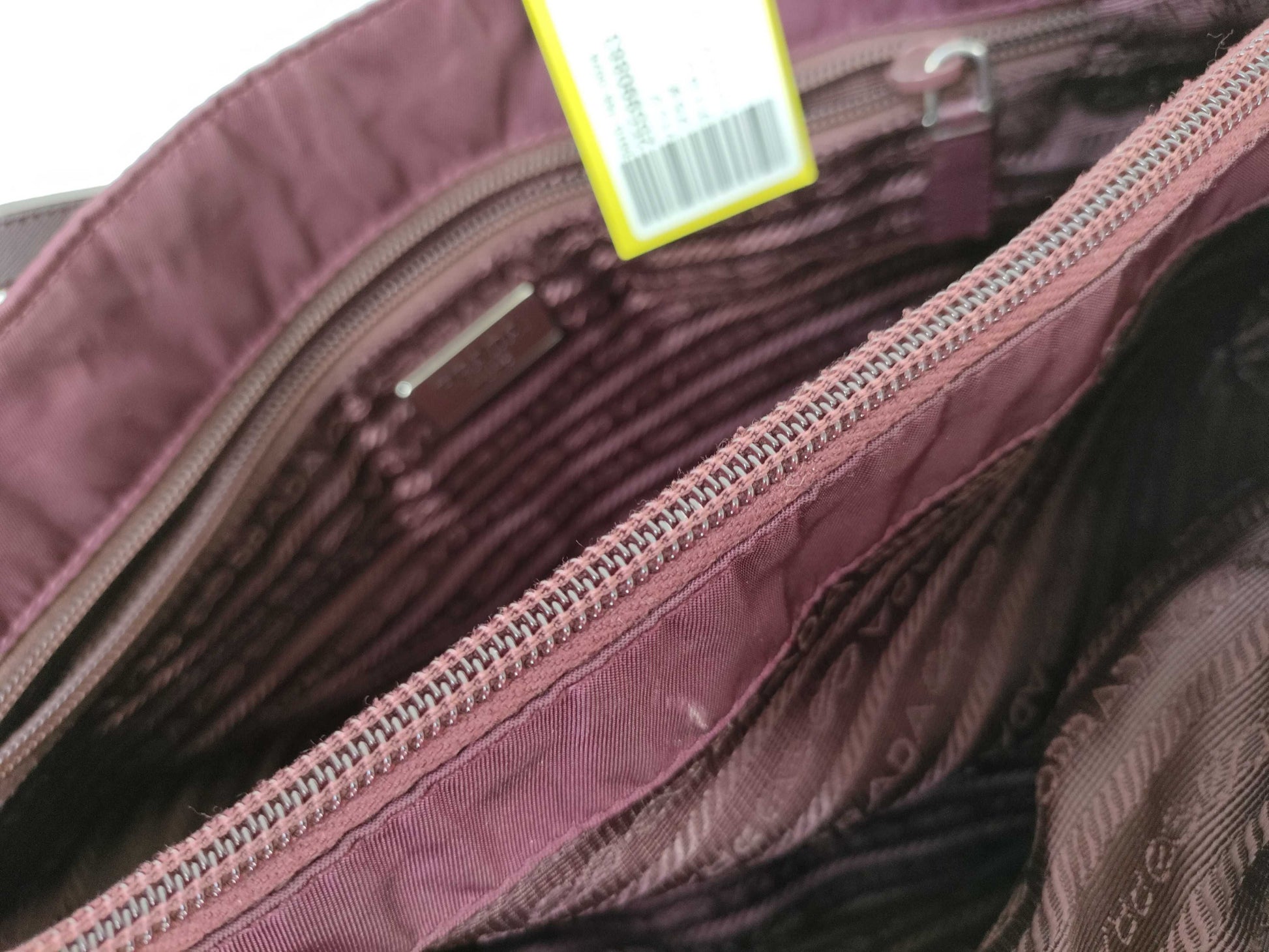 PRADA nylon handbag with leather triangle logo
