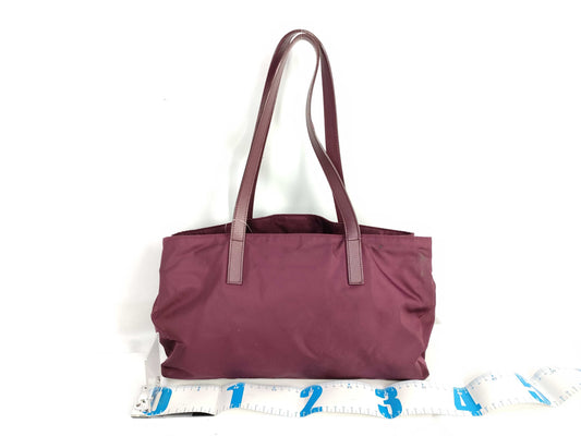 PRADA nylon handbag with leather triangle logo