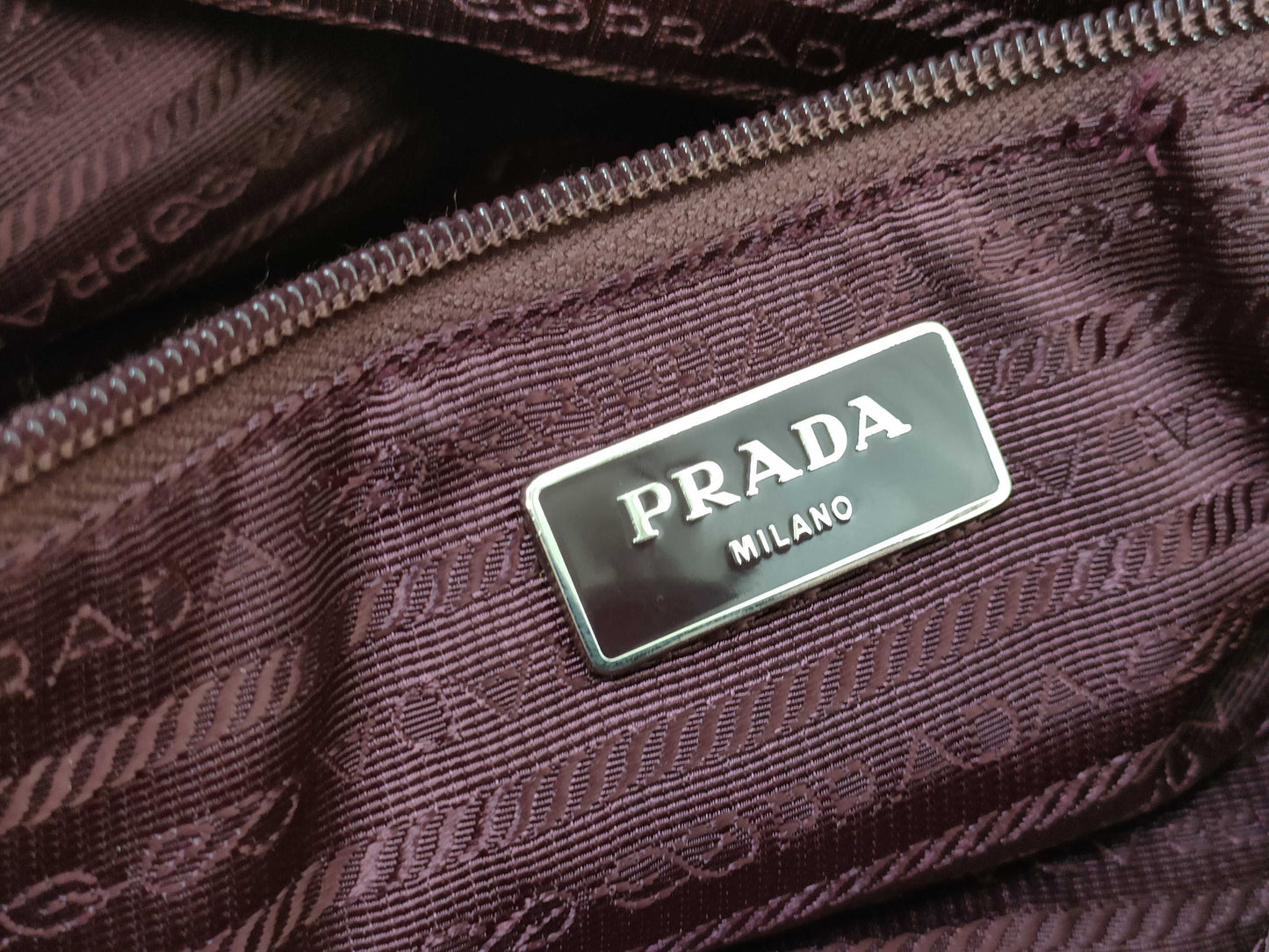 PRADA nylon handbag with leather triangle logo