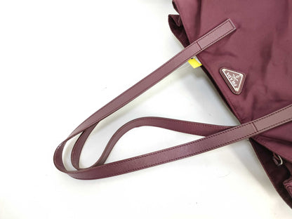 PRADA nylon handbag with leather triangle logo