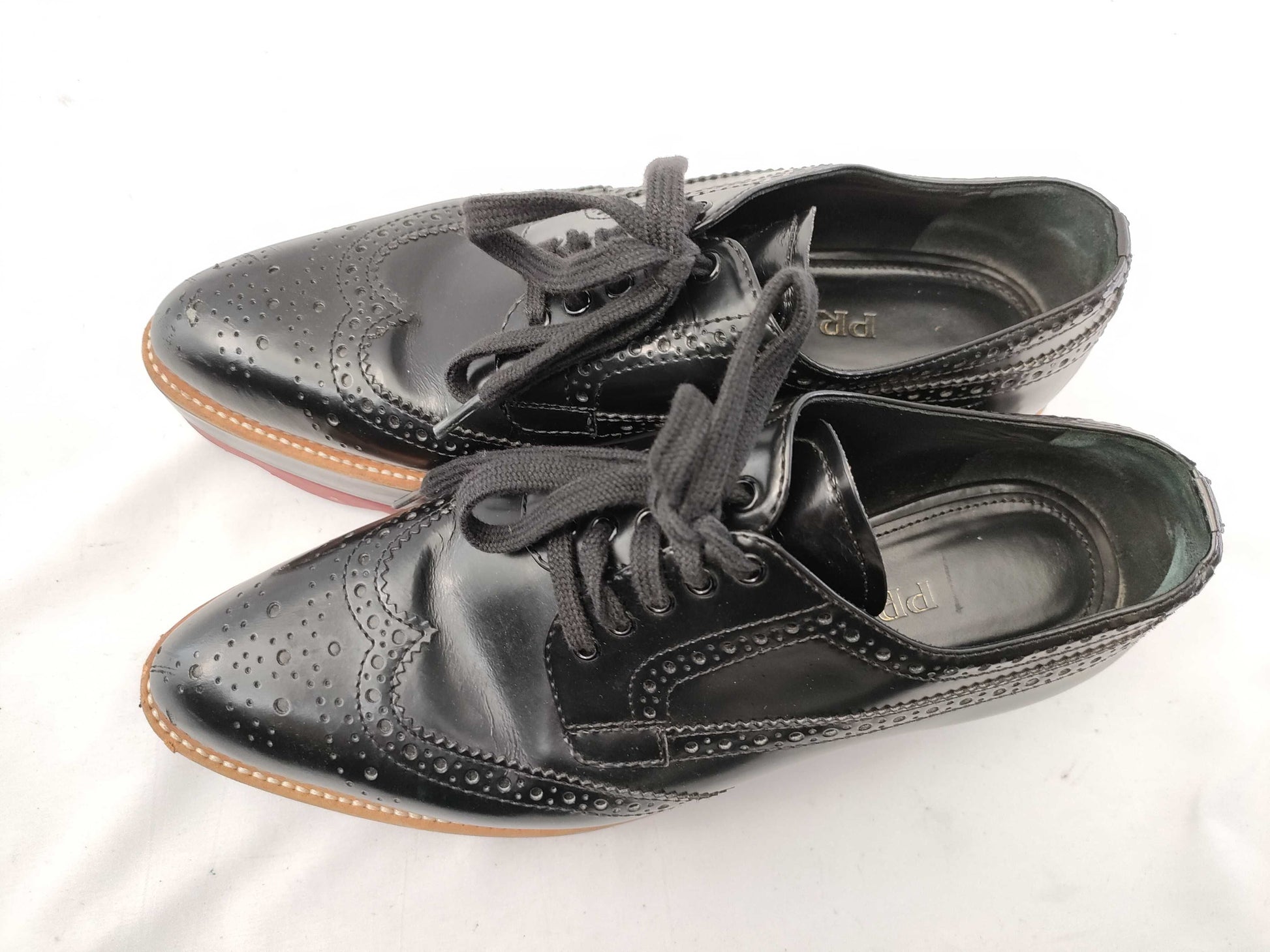 PRADA Wingtip Loafers