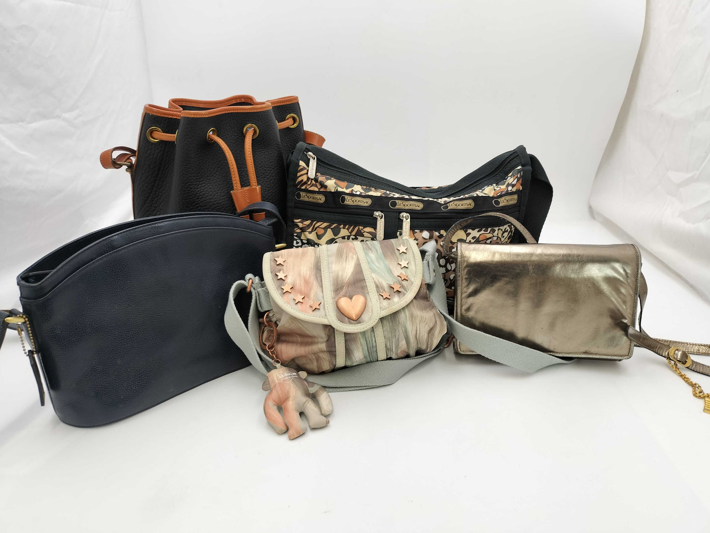 5 items including Coach and Ferragamo bags