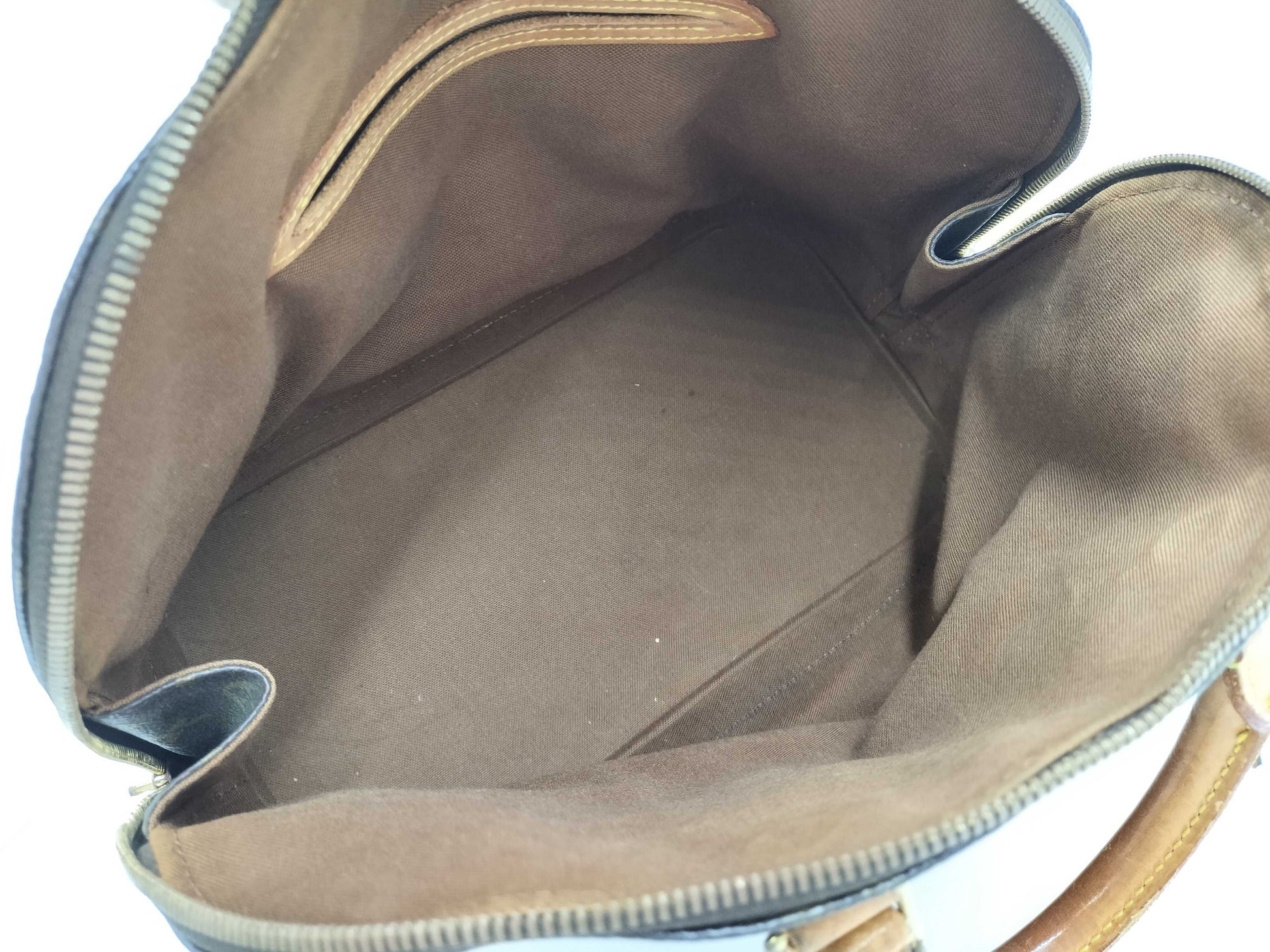 LOUIS VUITTON Monogram Alma Handbag