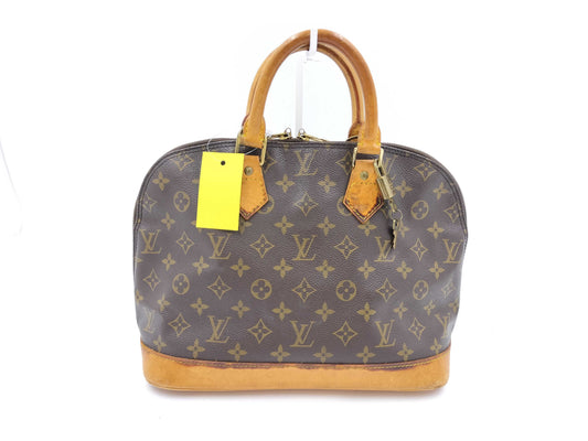 LOUIS VUITTON Monogram Alma Handbag