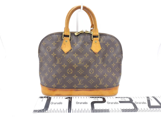 LOUIS VUITTON Monogram Alma Handbag