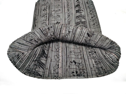 ISSEY MIYAKE Pleated Bottoms and All-Over Print Tops