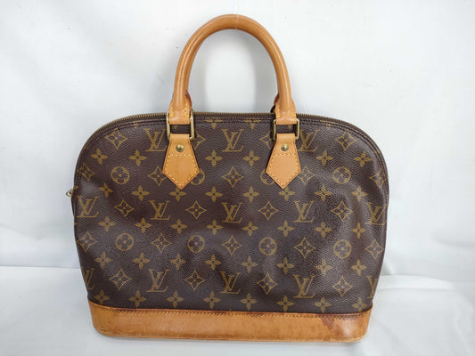 LOUIS VUITTON Monogram Alma Handbag