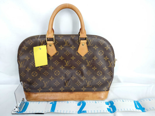 LOUIS VUITTON Monogram Alma Handbag