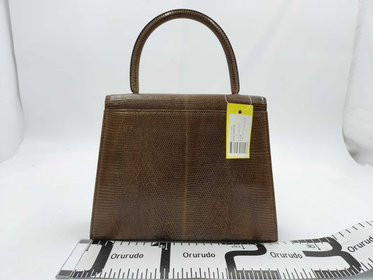 Yves Saint Laurent Lizard Handbag Handbag