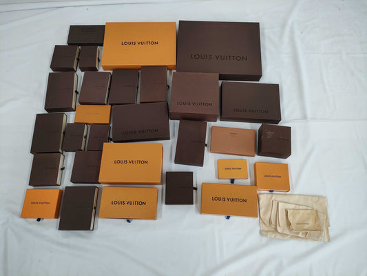 LOUIS VUITTON 27-piece L-tiered bag, approximately 70% empty brand boxes.