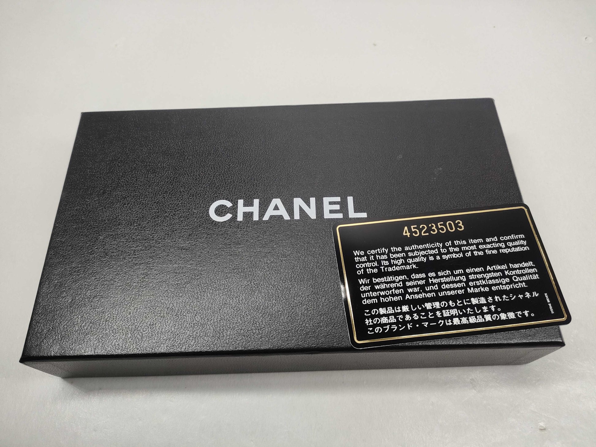 CHANEL [With sticker card] No. 4 long wallet with warranty card and box