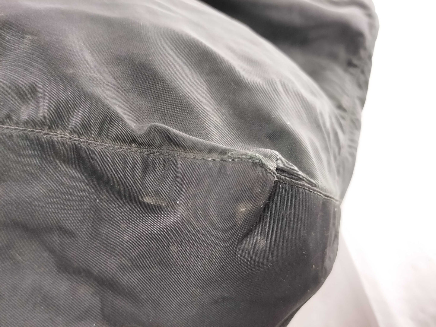 PRADA nylon triangular logo bag, zipper damage, condition considered. Tote bag