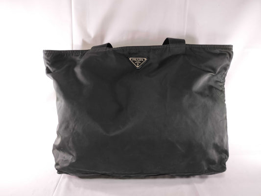 PRADA nylon triangular logo bag, zipper damage, condition considered. Tote bag