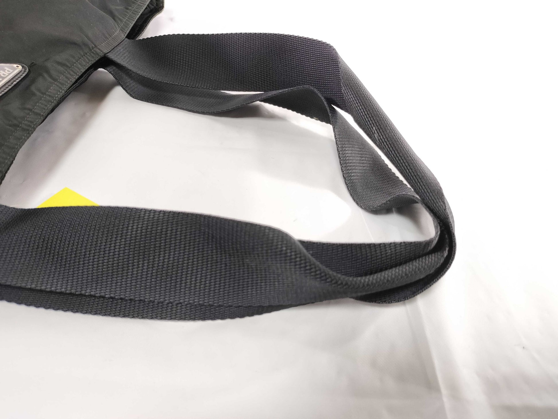 PRADA nylon triangular logo bag, zipper damage, condition considered. Tote bag