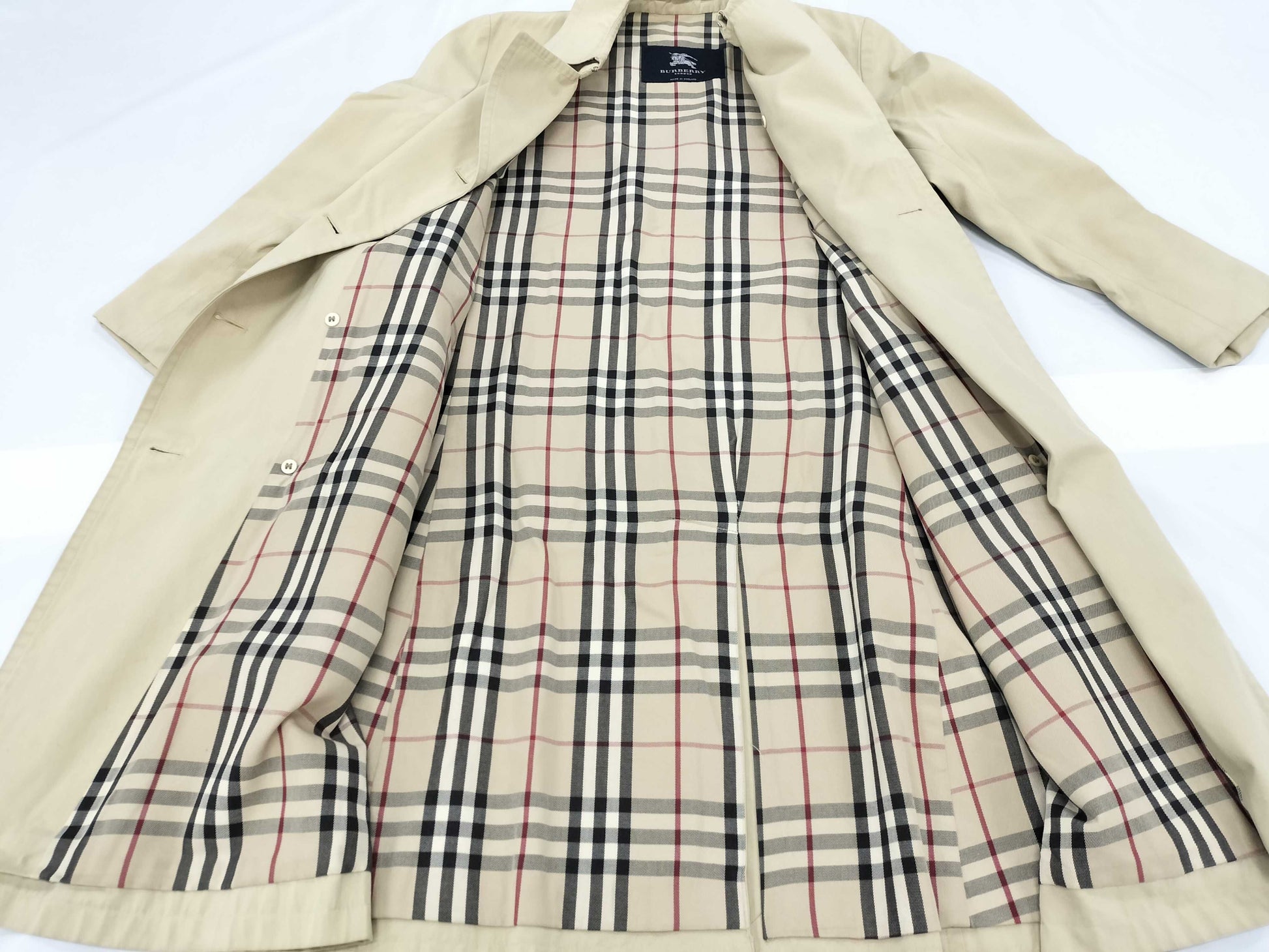 BURBERRY trench coat with torn sleeves