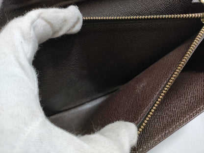 LOUIS VUITTON RFID serial number cannot be verified. Damier Portefeuille Sarah old wallet.