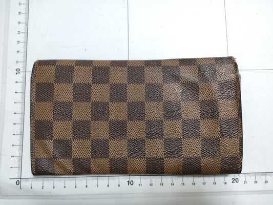 LOUIS VUITTON RFID serial number cannot be verified. Damier Portefeuille Sarah old wallet.