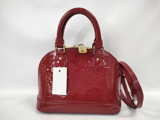 LOUIS VUITTON Vernis Alma BB Handbag