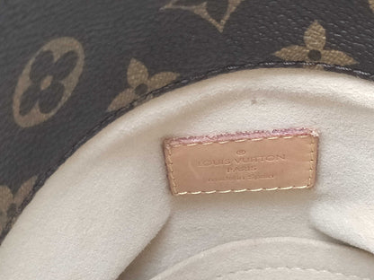 LOUIS VUITTON RFID verification failed. Serial number verification failed. Monogram Artsy MM Tote Bag.