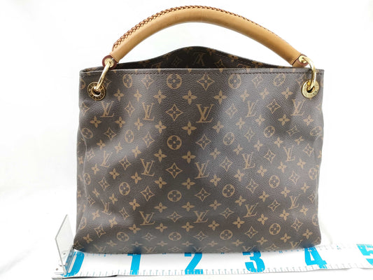LOUIS VUITTON RFID verification failed. Serial number verification failed. Monogram Artsy MM Tote Bag.