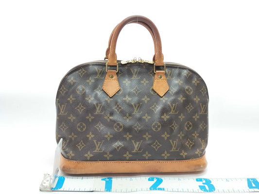LOUIS VUITTON VI 0988 Monogram Alma Handbag