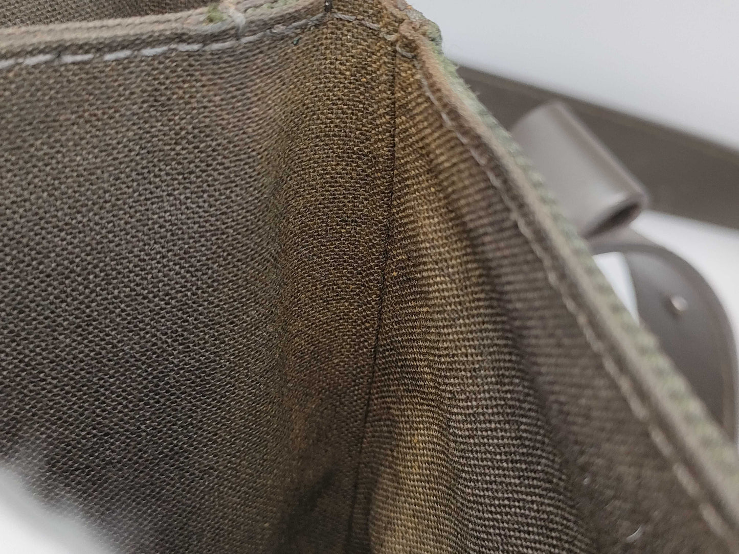 LOUIS VUITTON Taiga Saratov Shoulder Bag with Torn Belt