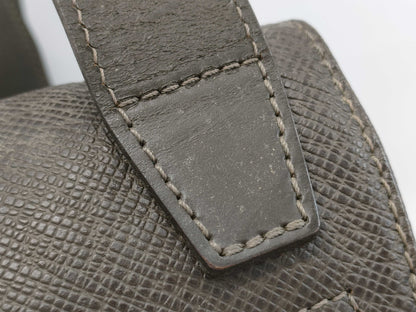 LOUIS VUITTON Taiga Saratov Shoulder Bag with Torn Belt