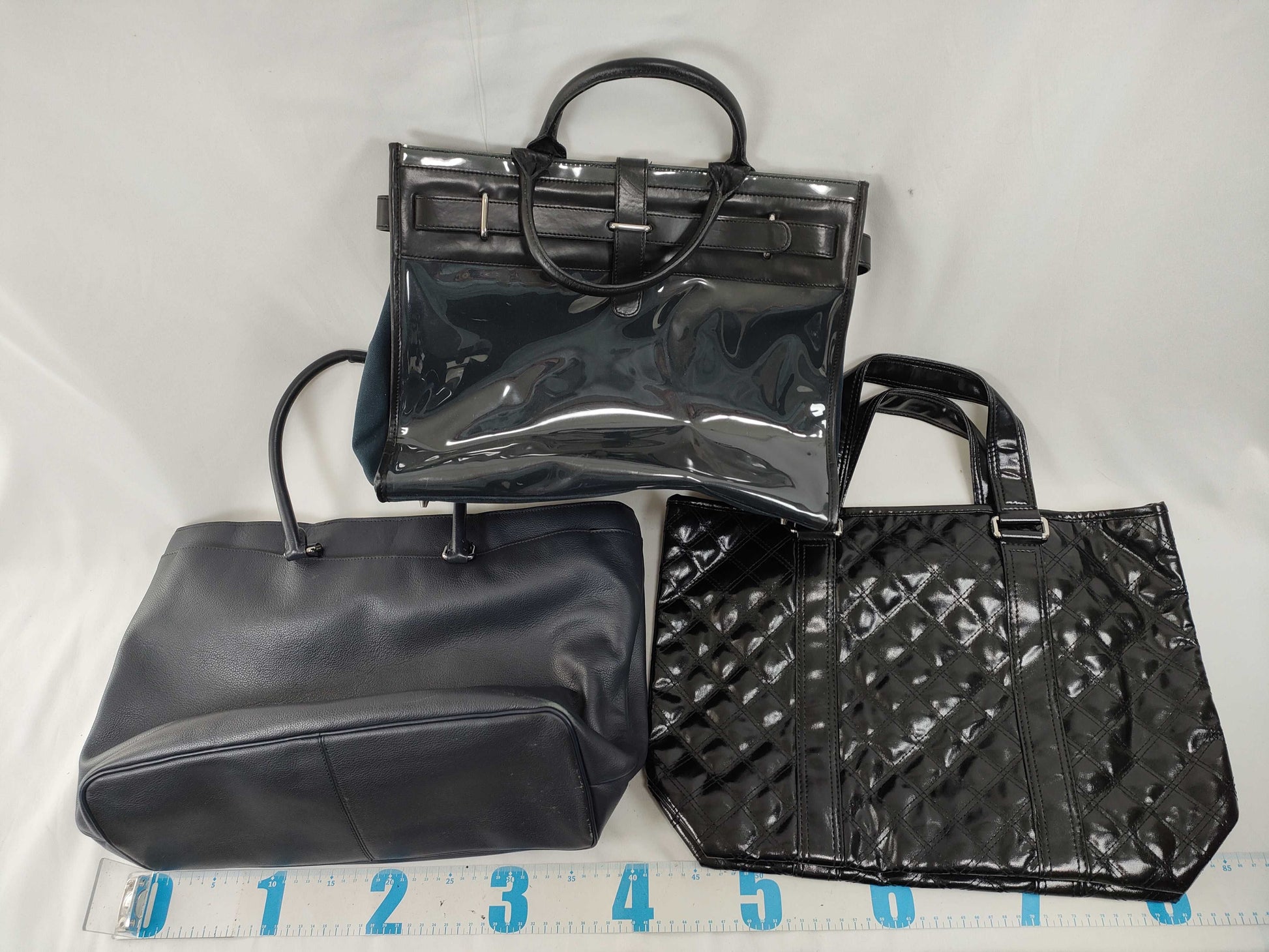 3 items including COACH, FURLA, and Marc Jacobs tote bags