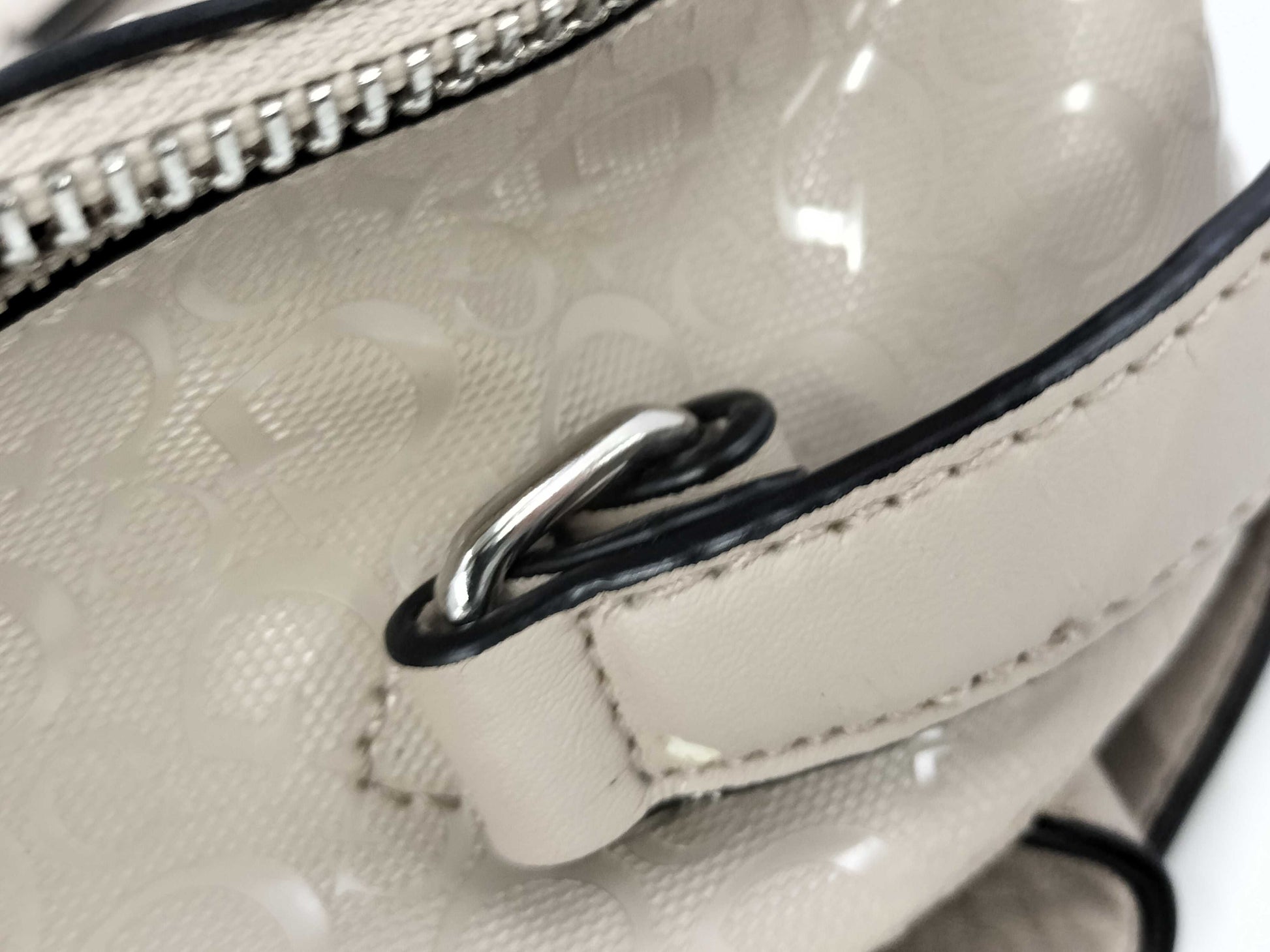 5 handbags including Coach and Guess