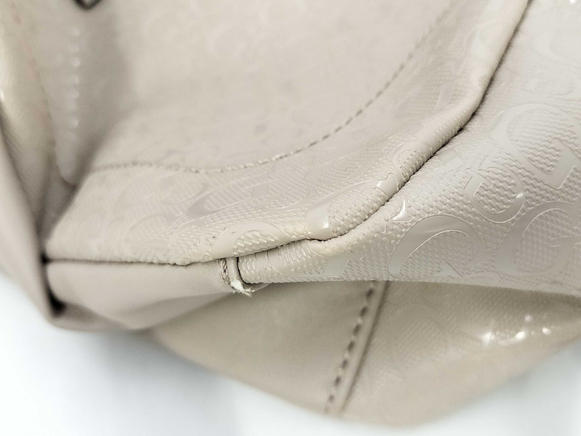 5 handbags including Coach and Guess
