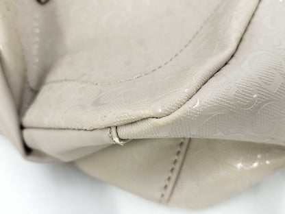 5 handbags including Coach and Guess
