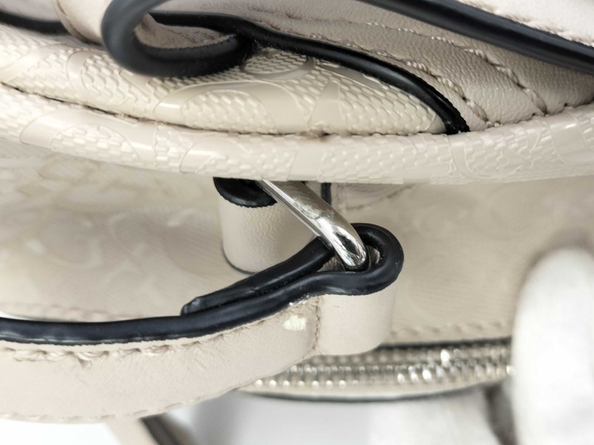 5 handbags including Coach and Guess
